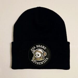 Black beanie with skull astronaut patch.